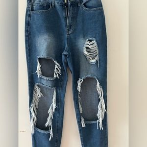 Dark washed ripped jeans